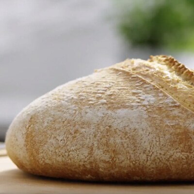 Loaf of sourdough bread on a countertop