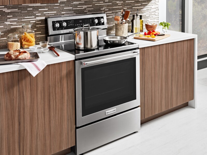 A stainless steel KitchenAid® freestanding gas range. A stainless steel KitchenAid® freestanding gas range.