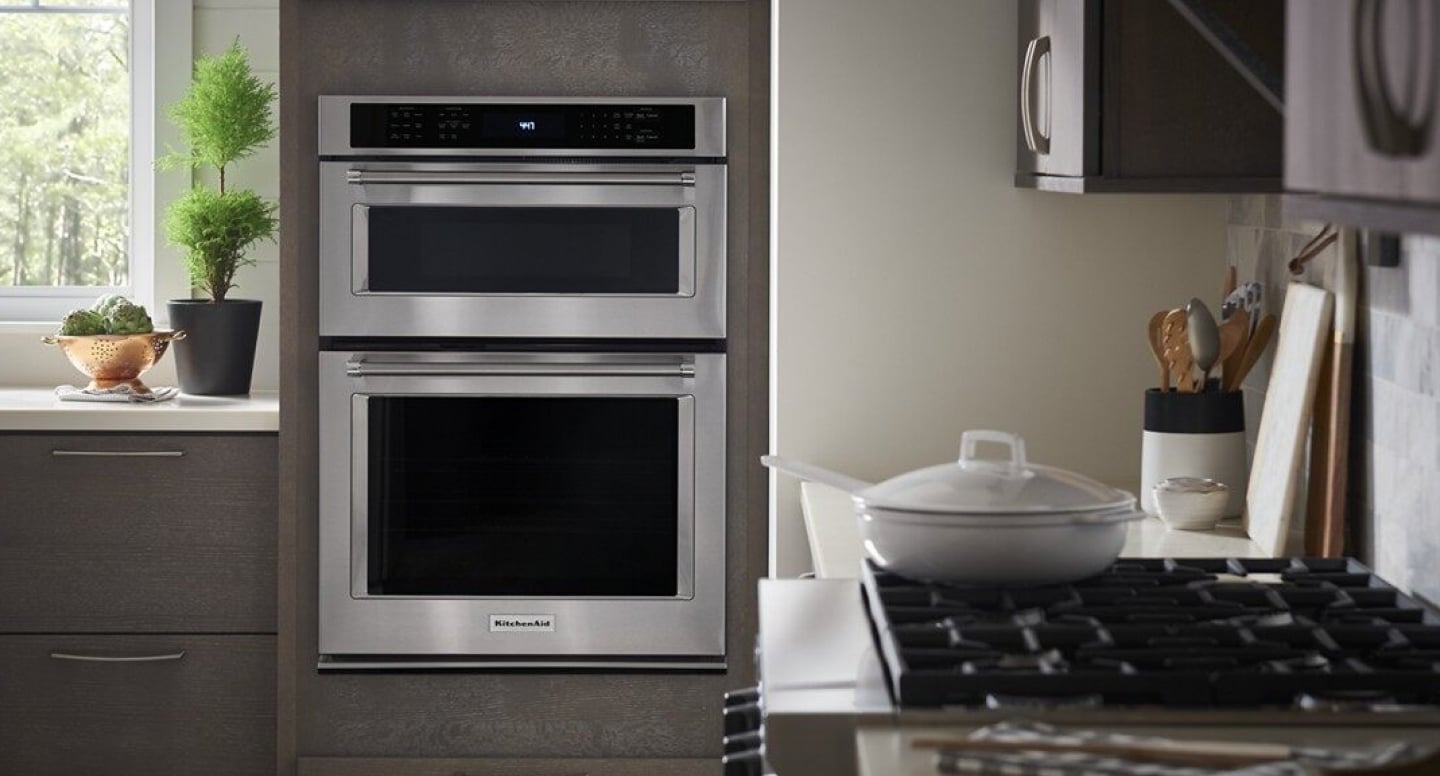 A KitchenAid® stainless steel combination wall oven A KitchenAid® stainless steel combination wall oven