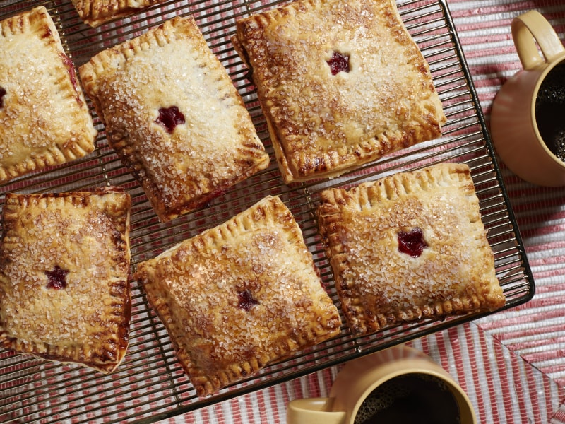 Air-fried strawberry hand pies on a baking rack Air-fried strawberry hand pies on a baking rack