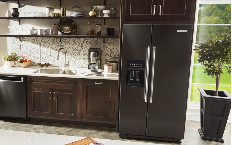 Black stainless steel full-depth refrigerator style in kitchen Black stainless steel full-depth refrigerator style in kitchen