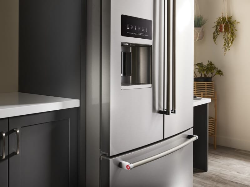  Closeup of a standard-depth stainless steel refrigerator