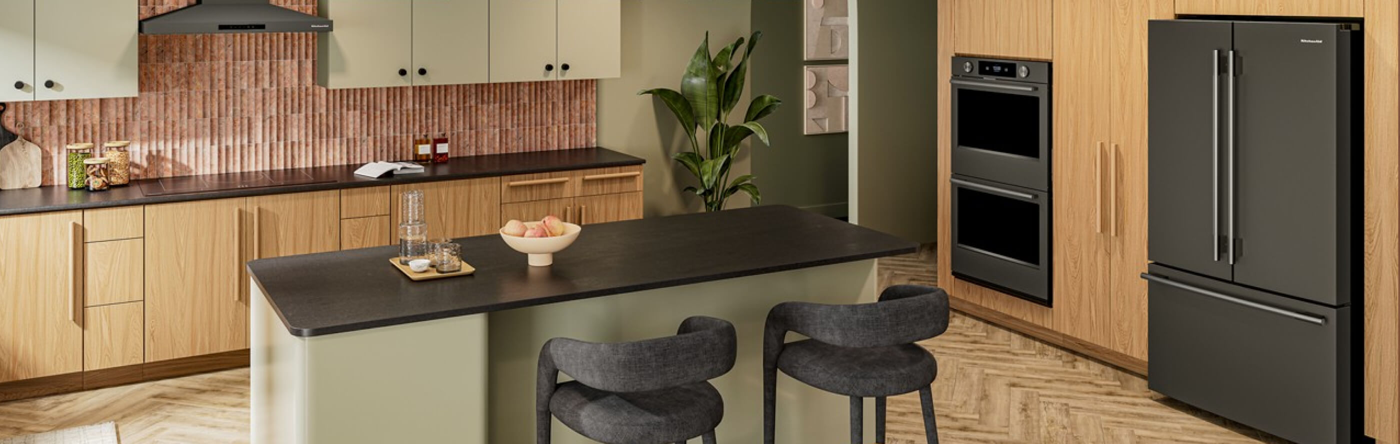  A kitchen with an island, wooden cabinetry, and a French door refrigerator