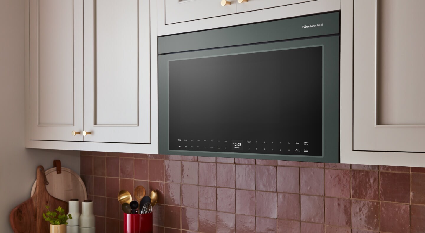  KitchenAid® Juniper over-the-range microwave in neutral-colored cabinetry