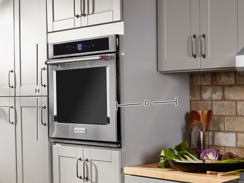 KitchenAid® Wall Oven in a kitchen with measurement lines KitchenAid® Wall Oven in a kitchen with measurement lines