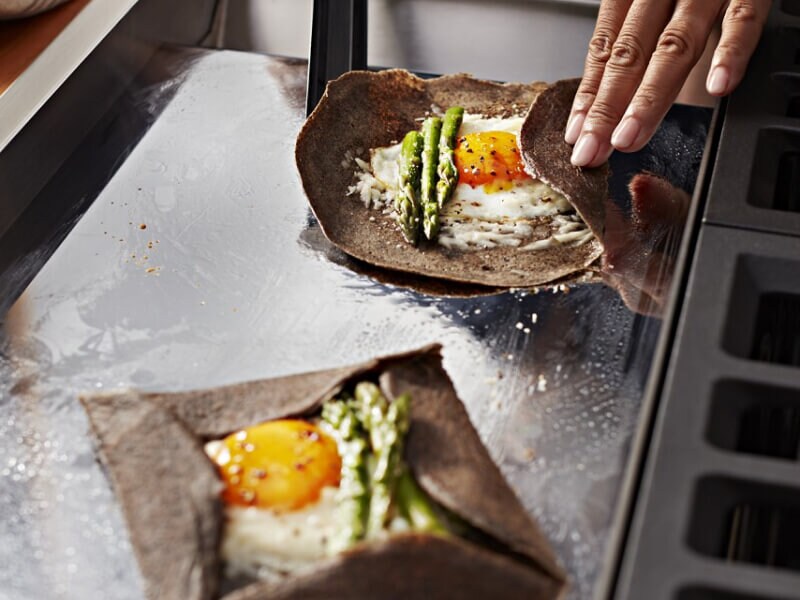 Person making a savory pastry