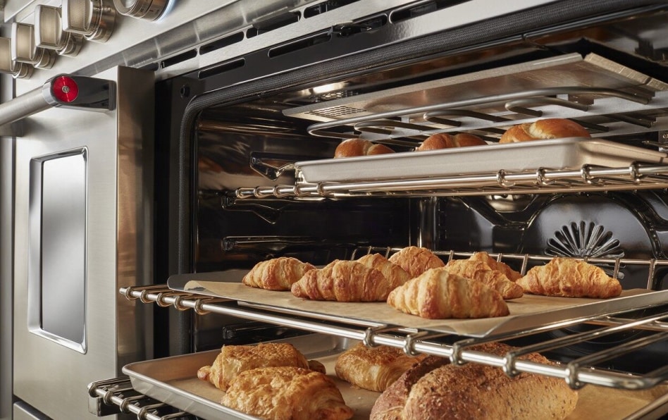 Baked Bread and rolls in an open convection oven Baked Bread and rolls in an open convection oven