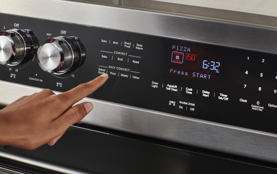 Hand selecting convection conversion setting on KitchenAid® oven Hand selecting convection conversion setting on KitchenAid® oven
