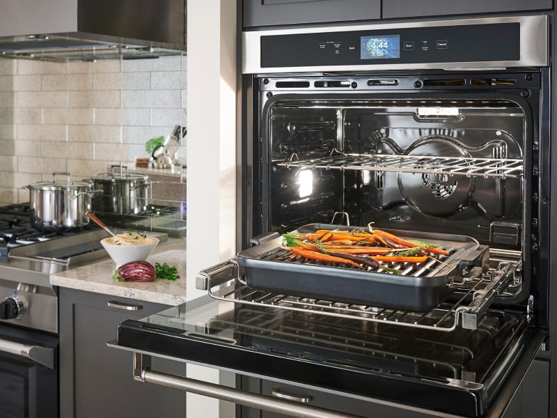 Roasted carrots on a baking sheet in a KitchenAid® wall oven Roasted carrots on a baking sheet in a KitchenAid® wall oven