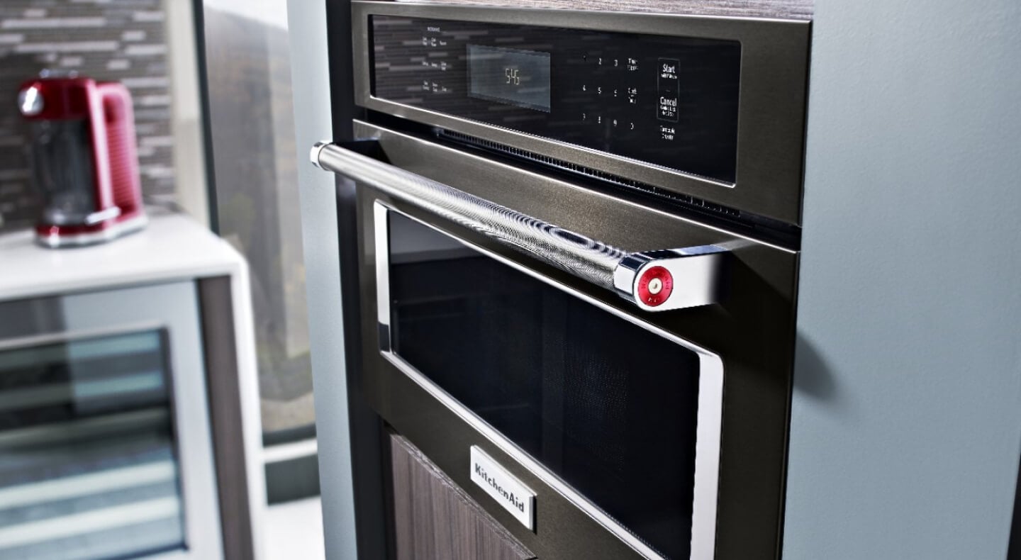 A KitchenAid® Over-the-Range Convection Microwave in a kitchen