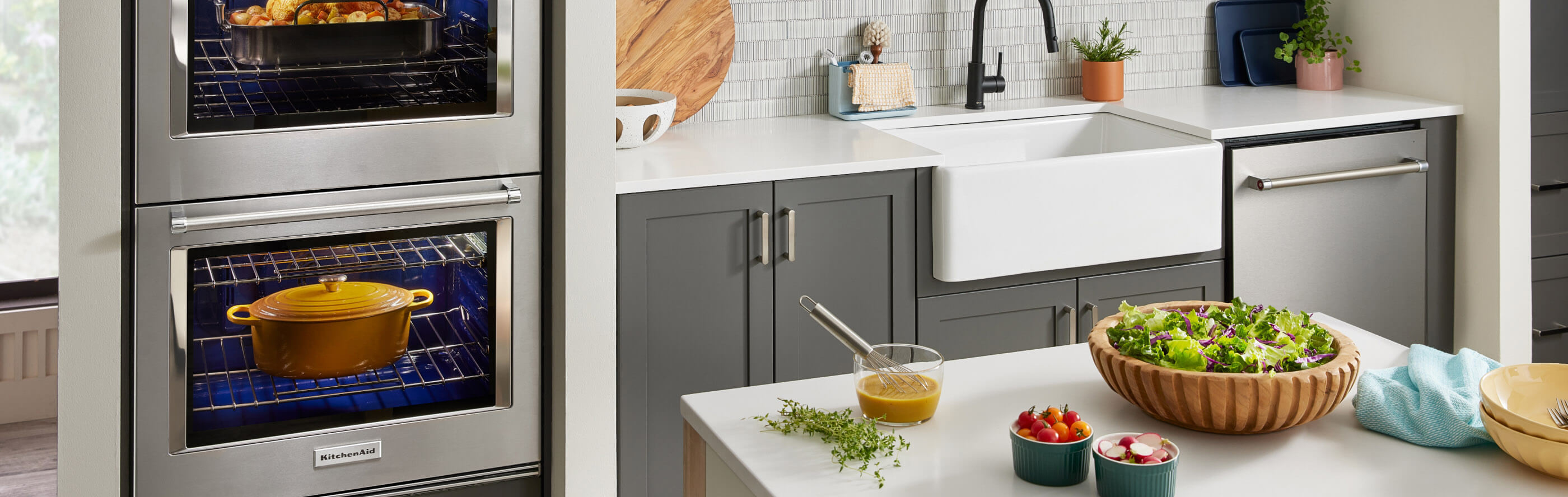 A modern kitchen with stainless steel KitchenAid® appliances and fresh food on the island