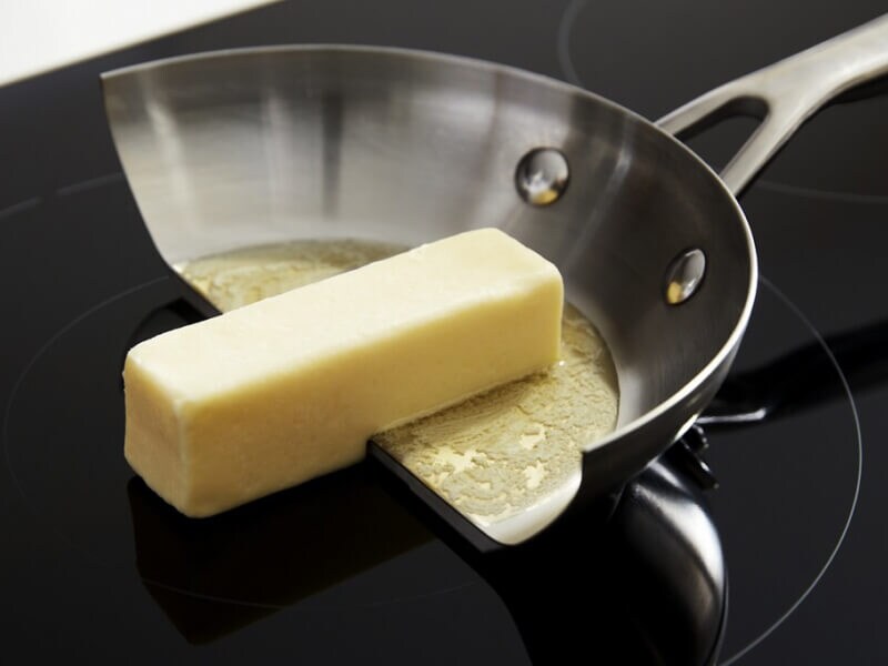 Stick of butter on an induction-compatible pan