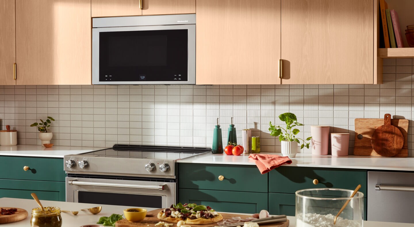 KitchenAid® over-the-range microwave above a KitchenAid® electric range
