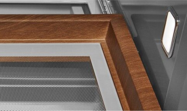 The detailed corner of the Premium Wood-Look Finish Sliding Storage Tray.