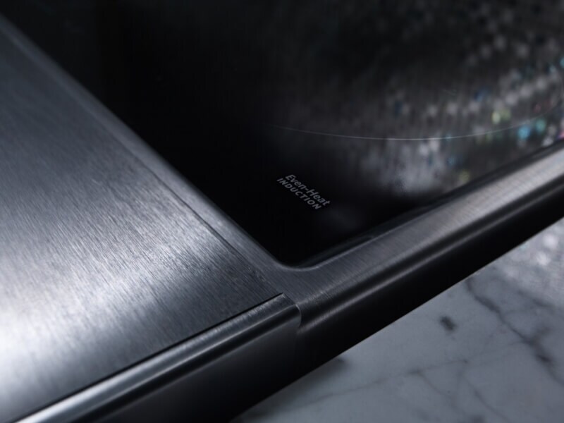 Closeup of an induction cooktop’s surface