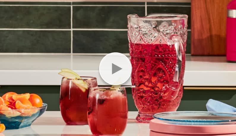 Two glasses filled with hibiscus sangria mocktail.
