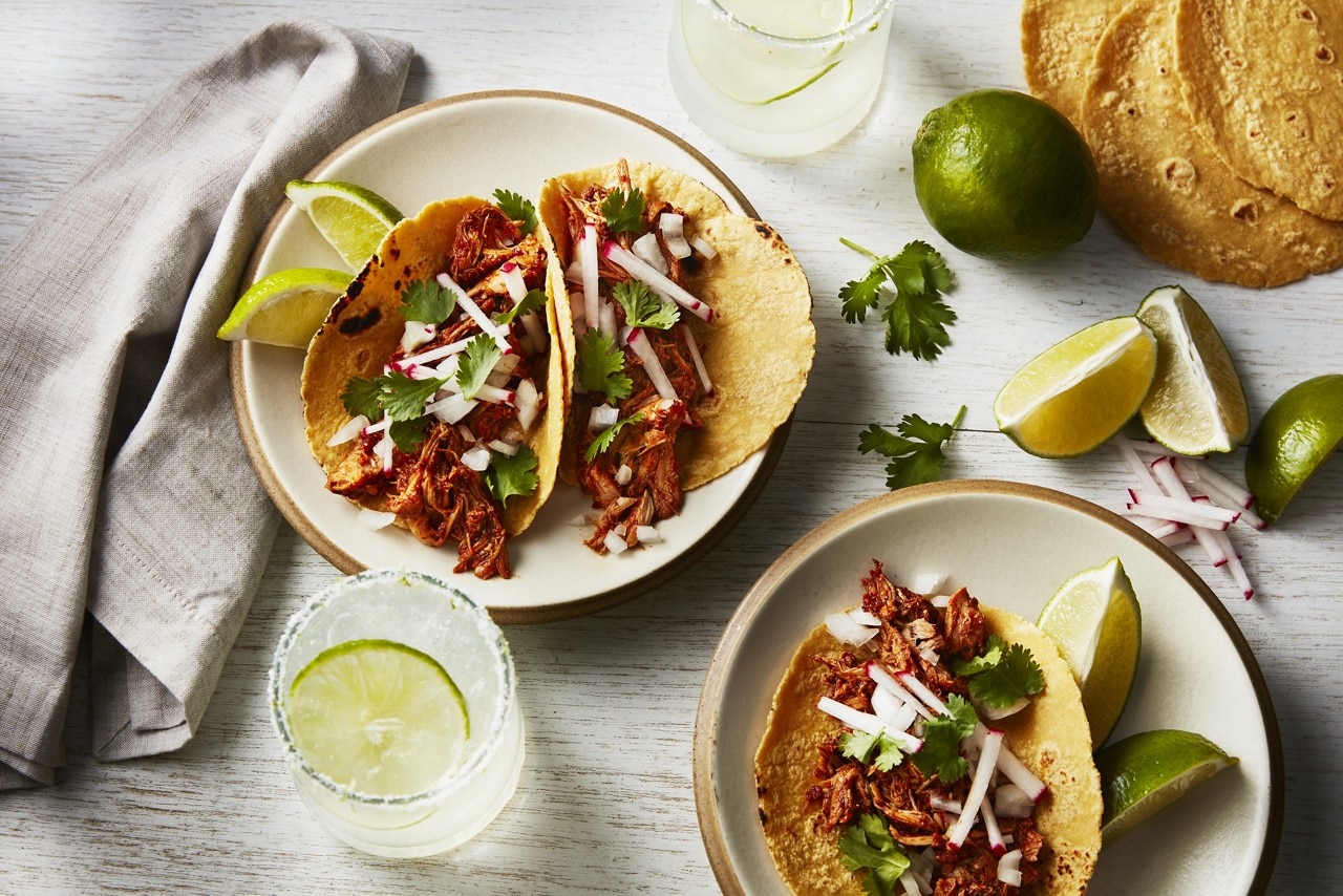 Slow-cooker cilantro stem chicken made from a food scrap recipe.