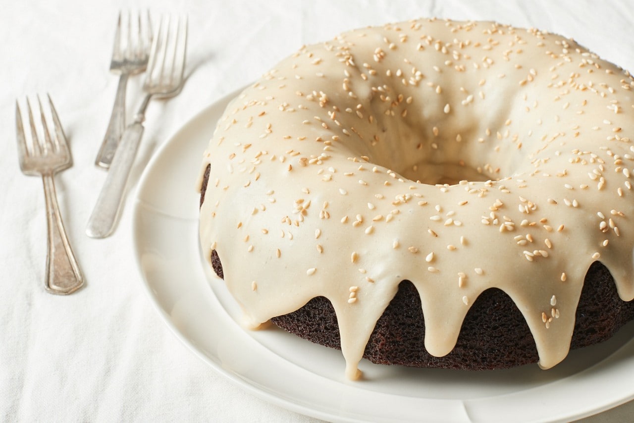 Learn how to make Ginger Stout Bundt Cake with Tahini Honey Glaze.