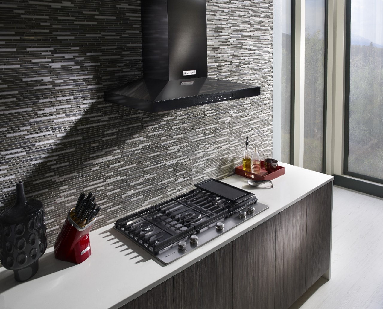 Complete your kitchen with a black stainless steel range hood from KitchenAid.