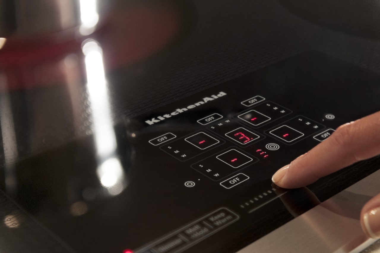 Cook complete meals with a four-burner electric cooktop.