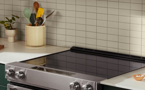 A kitchen with a KitchenAid® electric, slide-in range