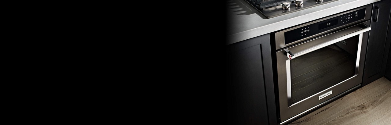 KitchenAid® black stainless steel oven featuring our unique flexible install system.
