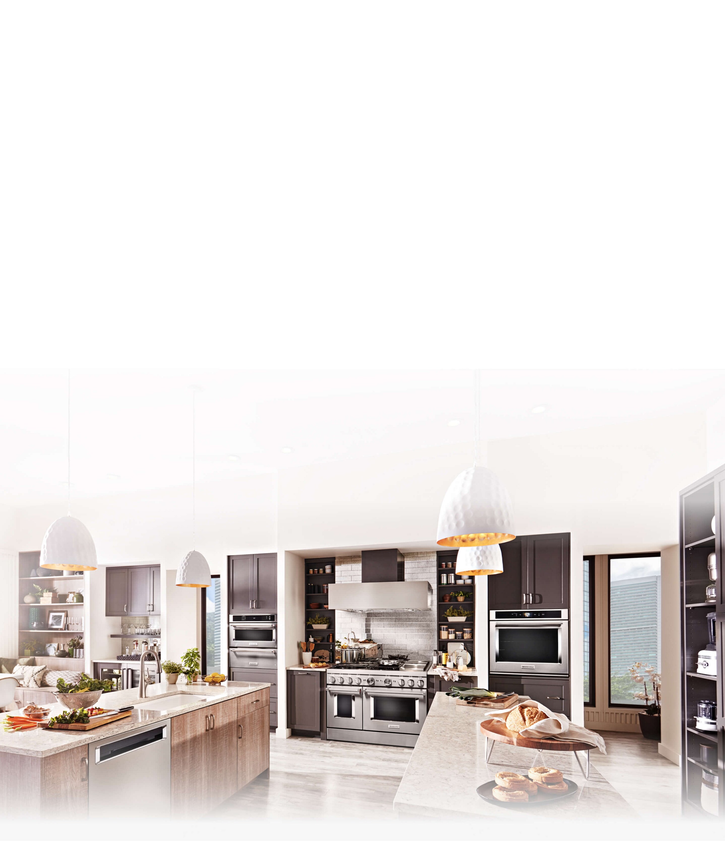 A clean, bright kitchen stocked with KitchenAid® appliances.