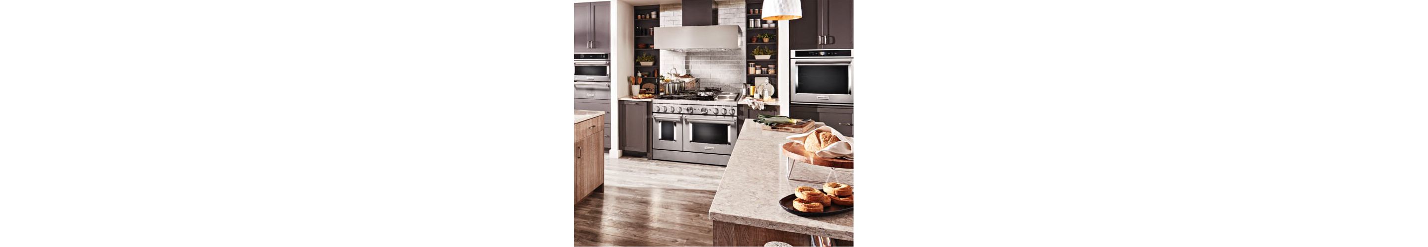 A clean, bright kitchen stocked with KitchenAid® appliances.