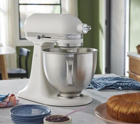 A Porcelain White Stand Mixer on a countertop.