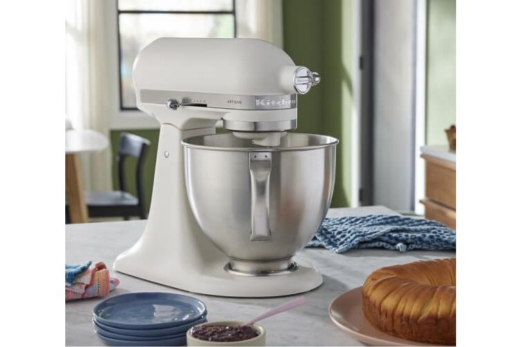 A Porcelain White Stand Mixer on a countertop.