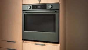 A Juniper wall oven built into a kitchen wall