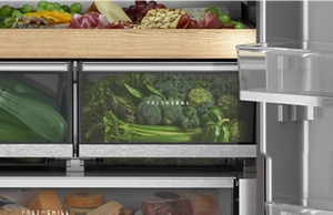 Fully stocked, clear storage bins with fresh vegetables and fruits inside