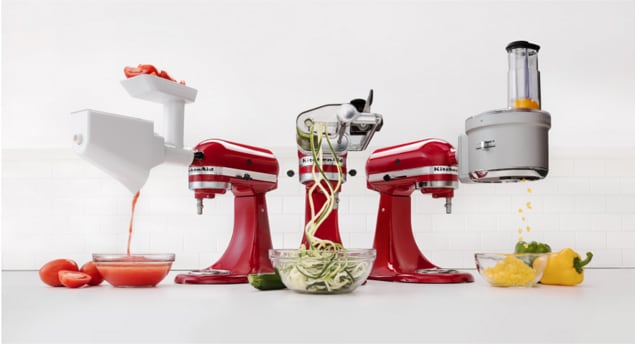 KitchenAid® stand mixers shown with different hub attachments in use.