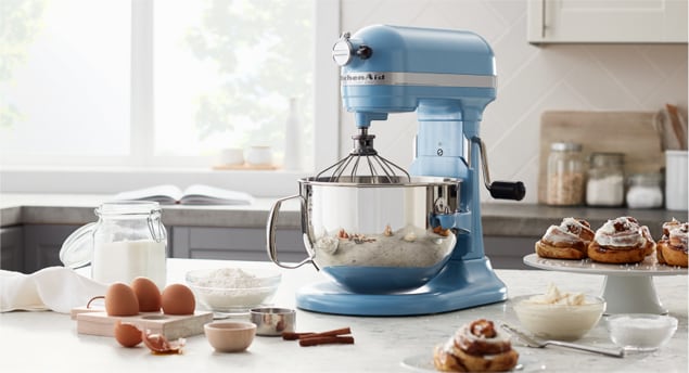 Preparing to whisk flour in a KitchenAid® stand mixer.
