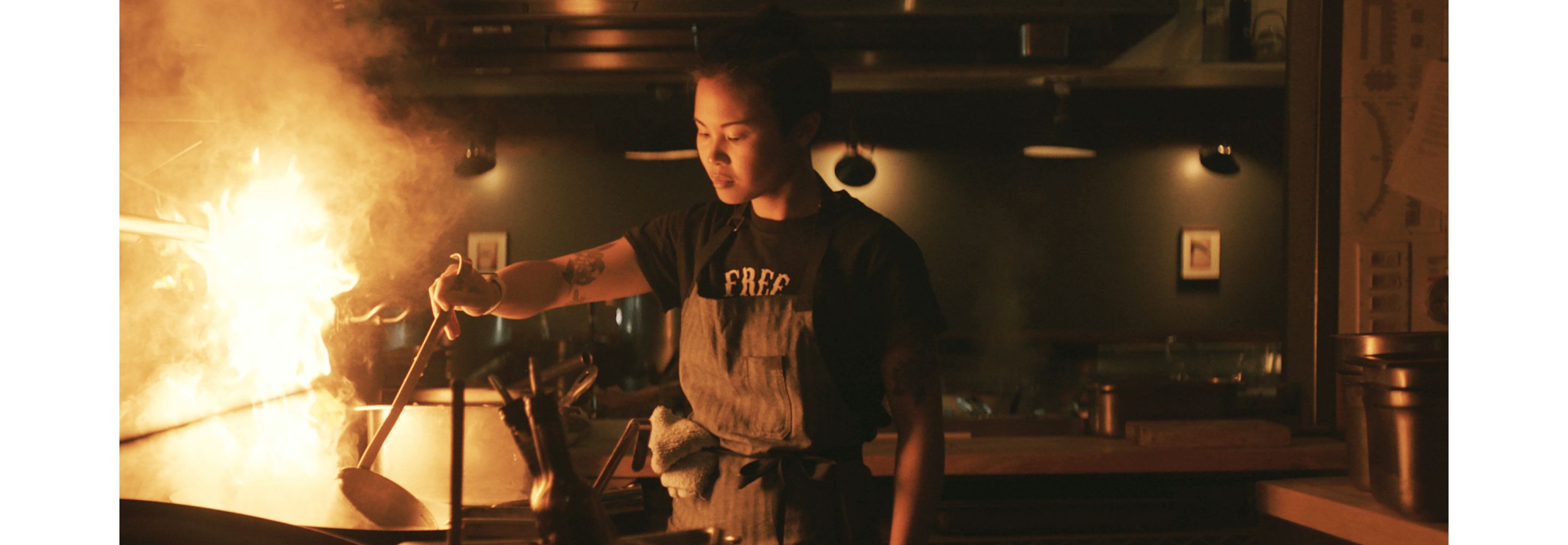 A chef working in a kitchen.