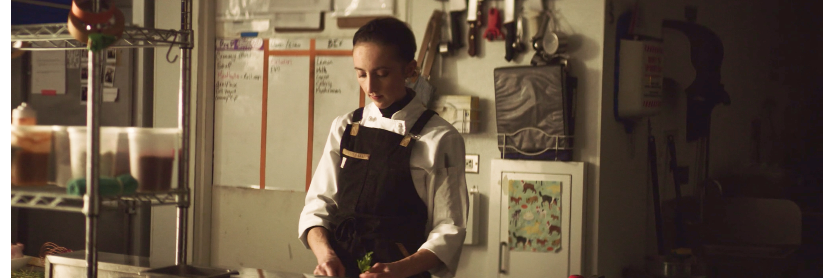Karyn Tomlinson confidently working in her kitchen.