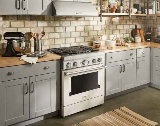 A sun-filled kitchen featuring a Milkshake Commercial-Style Range.