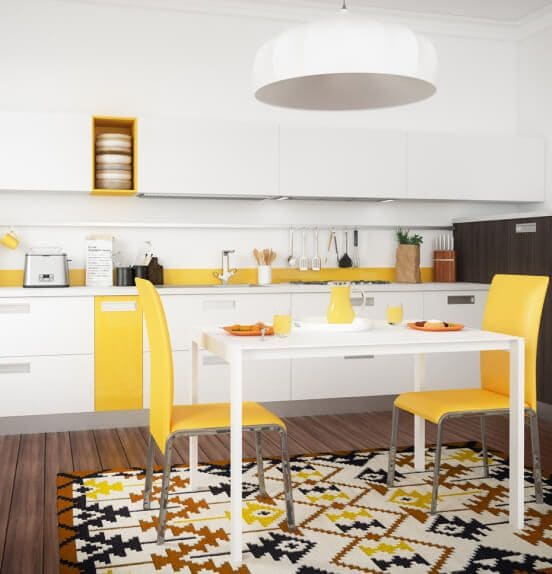 A bright white kitchen with yellow accents and decor.