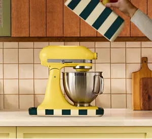 The 2025 Color of the Year Stand Mixer on a kitchen countertop.