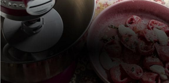 A bowl of beetroot tortellini.