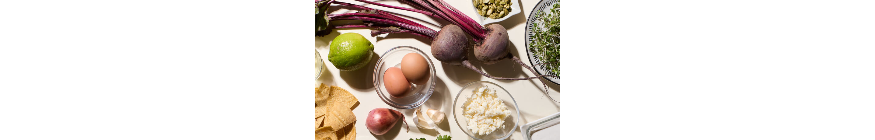 Beetroots and other ingredients on a table.