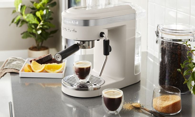 A Semi-Automatic Espresso Machine and Automatic Milk Frother Attachment.