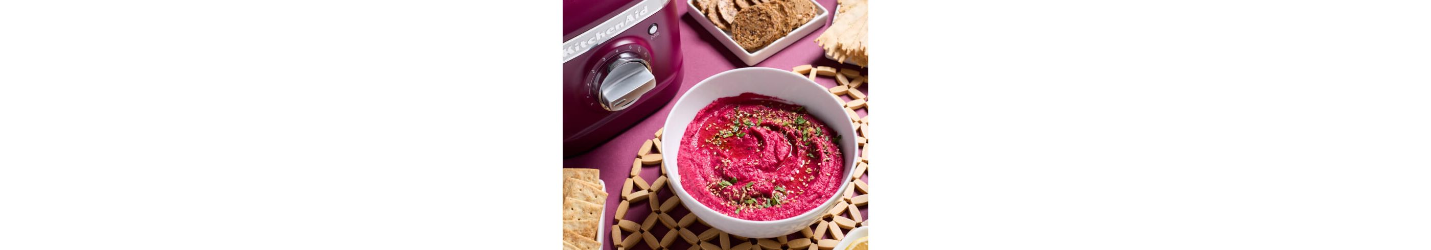 A bowl of beetroot hummus.