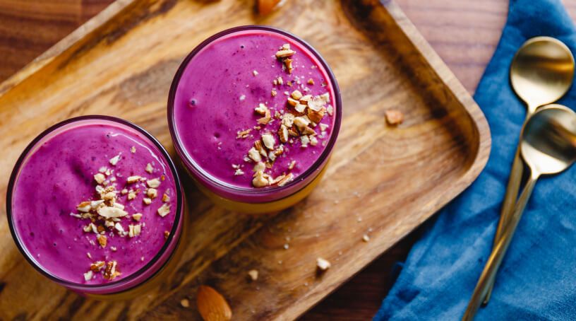 Two small smoothie bowls.