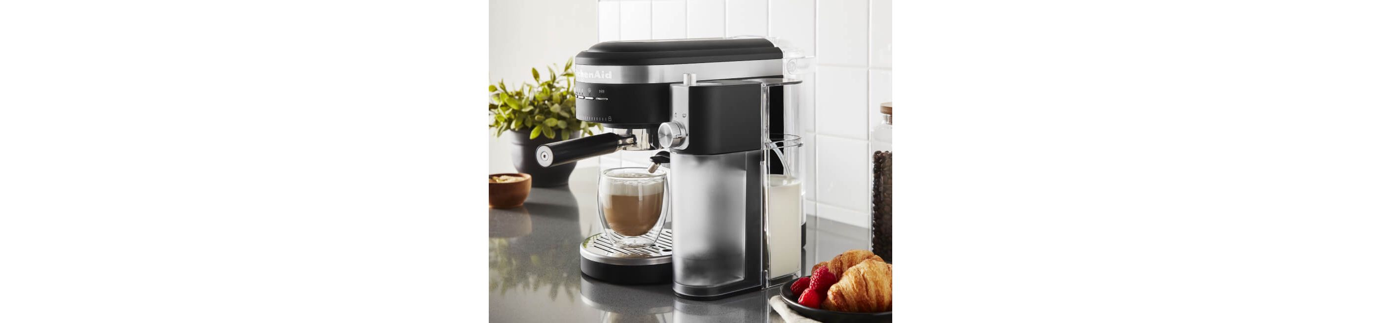 An Espresso Machine & Automatic Milk Frother.
