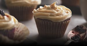 Cupcakes coated in creamy frosting.