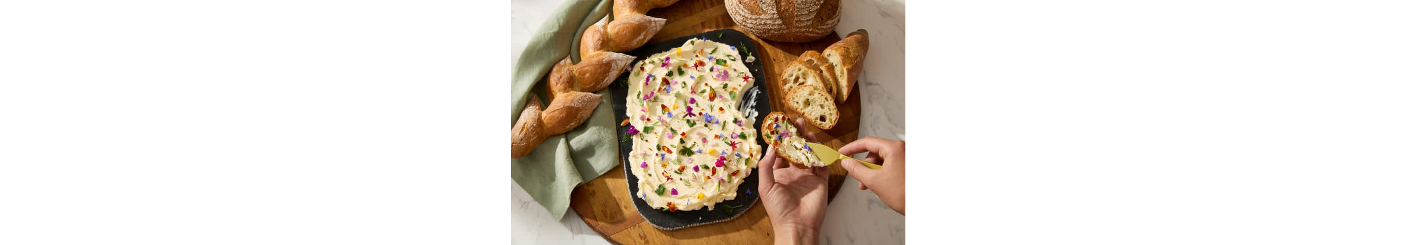 Herb and flower butter served with bread. 