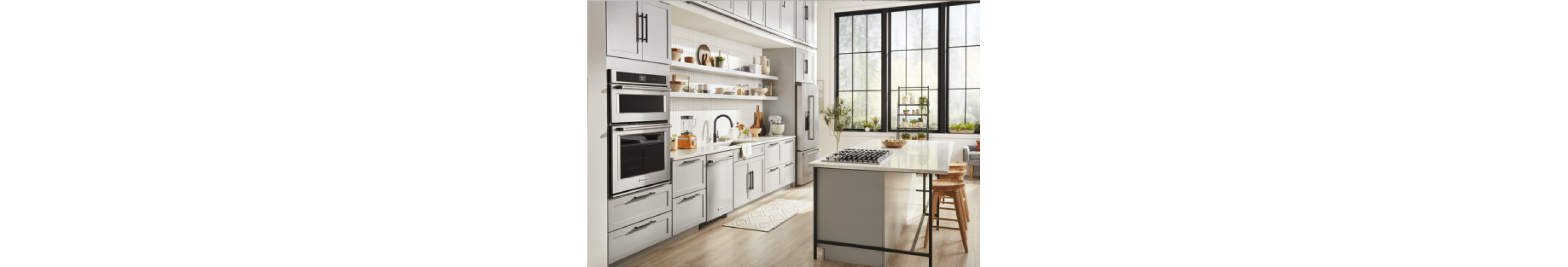 A neutral kitchen featuring KitchenAid appliances