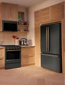 A Black Ore range and wall oven in a contemporary kitchen.