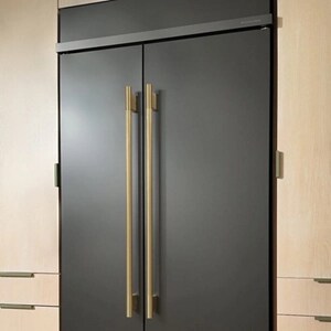 A stainless steel Refrigerator in a contemporary kitchen.